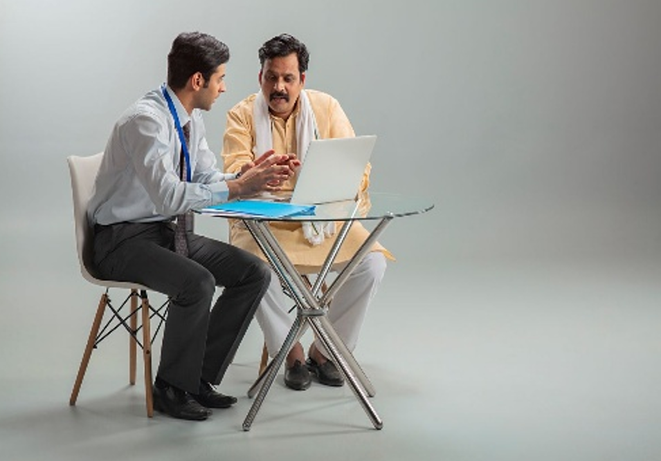 Happy couple discussing finances